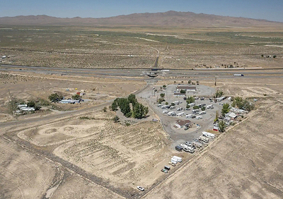 Figure 1: Accommodations property (lower centre) with Springer visible in background Figure 1: Accommodations property (lower centre) with Springer visible in background