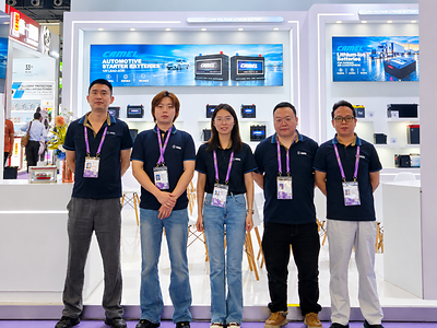 Camel Group representatives at the company’s booth during the 140th Canton Fair in Guangzhou, China.