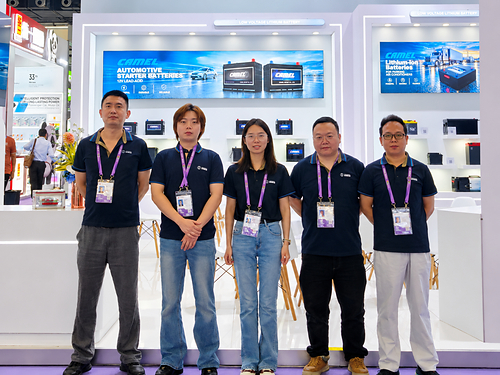 Camel Group representatives at the company’s booth during the 140th Canton Fair in Guangzhou, China. This image opens in the lightbox