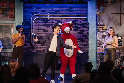 Saturday Night Live cast member Jeremy Culhane celebrates with The Laughing Cow® onstage at Chicago's The Second City after a special comedy performance helped the beloved brand icon laugh again for the first time in nearly a month.