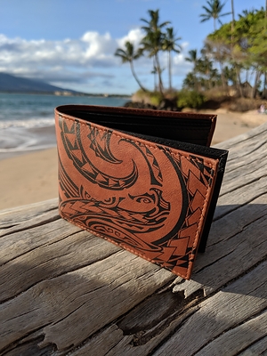 Award-winning Maui Tattoo artist Kuaika Quenga created the Mano - shark - tattoo for NĀ KOA leather wallets. The tattoo is available on bifold wallets, money clip wallets and wallets with an added flip out compartment at www.nakoa.com Award-winning Maui Tattoo artist Kuaika Quenga created the Mano - shark - tattoo for NĀ KOA leather wallets. The tattoo is available on bifold wallets, money clip wallets and wallets with an added flip out compartment at www.nakoa.com