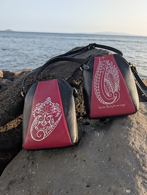 Honu (sea turtle) tattoo art by Teva Lowy and sea bird wing tattoo by Megan Jones are featured on NĀ KOA purses. Lowy's art is based on his Tahitian roots. Jones intricate design is composed with Hawaiian motifs Honu (sea turtle) tattoo art by Teva Lowy and sea bird wing tattoo by Megan Jones are featured on NĀ KOA purses. Lowy's art is based on his Tahitian roots. Jones intricate design is composed with Hawaiian motifs