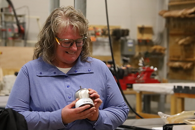 Kora Huffman received a Steel Apple award for bringing carpentry and advanced manufacturing to life at Kelly Walsh High School through hands-on projects that connect classroom learning to real-world opportunities.