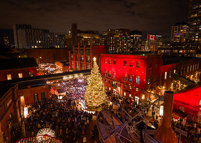 The Distillery Winter Village transforms the historic streets of Toronto's Distillery District into a holiday destination, pictured here from above. Opening November 12, 2026, with its annual Christmas tree lighting ceremony, this year's event features a lineup of live performances, immersive experiences, holiday shopping and seasonal food and drinks through January 3, 2027. More than one million visitors are expected throughout the season. (Photo: The Distillery Winter Village, 2025) The Distillery Winter Village transforms the historic streets of Toronto's Distillery District into a holiday destination, pictured here from above. Opening November 12, 2026, with its annual Christmas tree lighting ceremony, this year's event features a lineup of live performances, immersive experiences, holiday shopping and seasonal food and drinks through January 3, 2027. More than one million visitors are expected throughout the season. (Photo: The Distillery Winter Village, 2025)