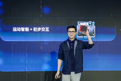 Peng Zhihui, Co-founder, President, CTO and Executive Director of AGIBOT, showcases a hardware component of AGIBOT’s AHA3 platform at AGIBOT Innovation Day 2026.
