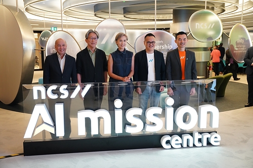 (From left) Singtel Group CEO Yuen Kuan Moon, NCS Chairman Lim Swee Say, Minister for Digital Development and Information Mrs. Josephine Teo, NCS CEO Sam Liew, and NCS Chief AI Officer Edward Chen at the launch of the NCS AI Mission Centre on 29 October 2026. (From left) Singtel Group CEO Yuen Kuan Moon, NCS Chairman Lim Swee Say, Minister for Digital Development and Information Mrs. Josephine Teo, NCS CEO Sam Liew, and NCS Chief AI Officer Edward Chen at the launch of the NCS AI Mission Centre on 29 October 2026.
