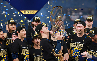 The Milwaukee Brewers celebrate its first championship win in New Era's 2026 MLB World Series Champions Locker Room 9FORTY® A-Frame Snapback.