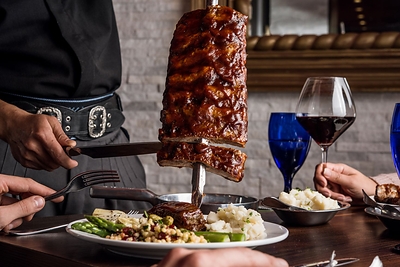 At Texas de Brazil, gauchos carve perfectly seasoned cuts of beef, lamb, pork, chicken and Brazilian sausage at the guest's table. The meat is cooked over a wood charcoal fire, the same way the cowboys of Southern Brazil have prepared it for generations.